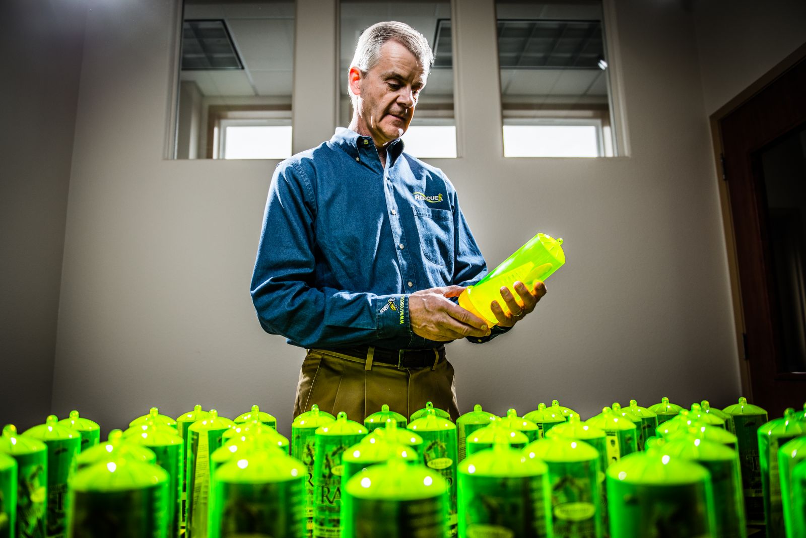 Rod Schneidmiller with his invention, the RESCUE! Yellowjacket Trap